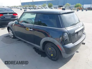 2009 MINI Cooper Hardtop with VIN WMWMF33589TW70400, listed as a IAAI auction lot 42055596 with 118,543 mi miles. Bid and sale history available at carsss.com. Image 3.