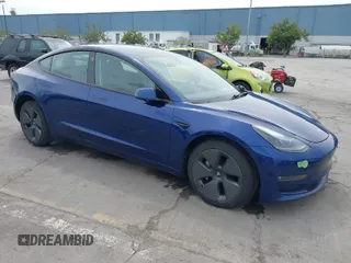2021 Tesla Model 3 Long Range with VIN 5YJ3E1EB6MF878411, listed as a IAAI auction lot 41986947 with 71,978 mi miles. Bid and sale history available at carsss.com. Image 1.