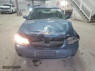1999 Chevrolet Malibu with VIN 1G1ND52T2X6221114, listed as a Copart auction lot 80739084 with 128,323 mi miles and Salvage Title. Bid and sale history available at carsss.com. Image 5.