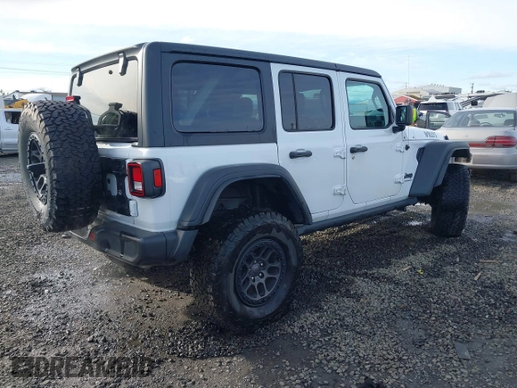 2023 Jeep Wrangler Sport with VIN 1C4HJXDG4PW567027, listed as a IAAI auction lot 41633197 with 14,782 mi miles and . Bid and sale history available at DreamBid. Image 4.
