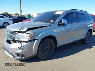 2019 Dodge Journey SE with VIN 3C4PDCBG0KT701223, listed as a IAAI auction lot 41286446 with 71,572 mi miles and . Bid and sale history available at DreamBid. Image 2.
