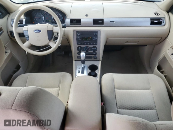 2006 Ford Five Hundred SE с VIN 1FAFP23146G150401, выставлен на аукционе Copart как лот 57000605 с пробегом 218 689 миль миль и Списание • Salvage title. История ставок и продаж доступна на DreamBid. Изображение 8.