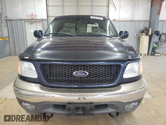 2002 Ford F-150 XL with VIN 1FTRX18L62NA69837, listed as a Copart auction lot 61581935 with 130,078 mi miles and Salvage title. Bid and sale history available at DreamBid. Image 5.