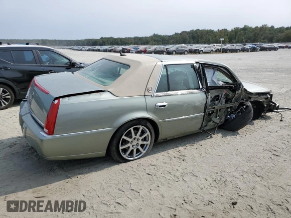 2007 Cadillac DTS Performance z VIN 1G6KD57967U131549, wystawiony jako Copart lot #70918804 z przebiegiem 73 618 mil mil oraz Szkoda całkowita • Salvage title. Historia ofert i sprzedaży dostępna na DreamBid. Obrazek 3.