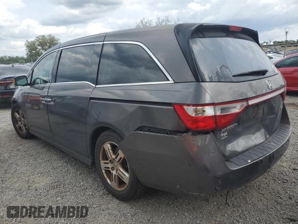 2012 Honda Odyssey Touring with VIN 5FNRL5H94CB102177, listed as a Copart auction lot 55942185 with 179,418 mi miles and Salvage Title. Bid and sale history available at DreamBid. Image 2.