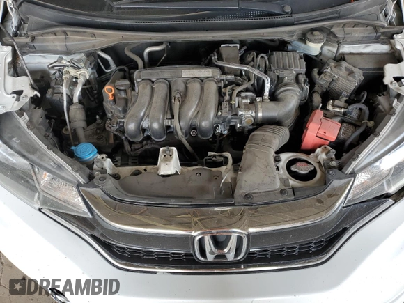 2019 Honda Fit LX z VIN 3HGGK5H48KM738241, wystawiony jako Copart lot #62702695 z przebiegiem 126 527 mil mil oraz Szkoda całkowita • Salvage title. Historia ofert i sprzedaży dostępna na DreamBid. Obrazek 11.