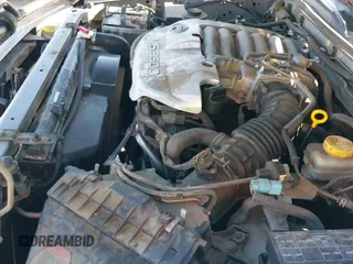 2003 Nissan Pathfinder LE z VIN JN8DR09Y43W832463, wystawiony jako IAAI lot #43426800 z przebiegiem 275 962 mil mil oraz . Historia ofert i sprzedaży dostępna na DreamBid. Obrazek 12.