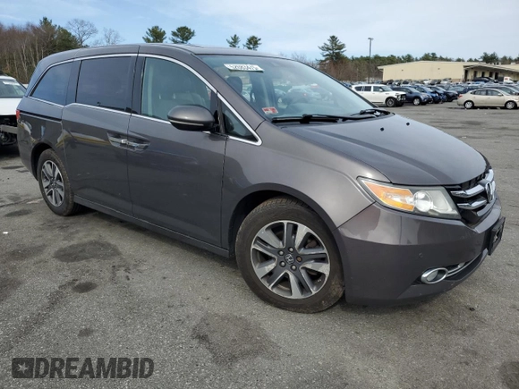 2015 Honda Odyssey Touring Elite with VIN 5FNRL5H95FB117971, listed as a Copart auction lot 52083475 with 82,626 mi miles and Salvage Title. Bid and sale history available at DreamBid. Image 4.