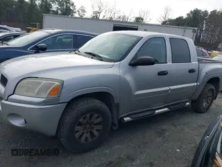 2007 Mitsubishi Raider LS with VIN 1Z7HC28K57S109584, listed as a IAAI auction lot 41498422 with 329,680 mi miles. Bid and sale history available at carsss.com. Image 14.