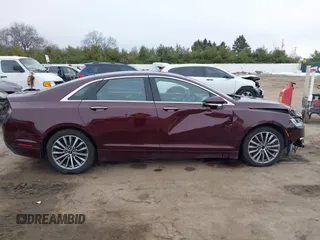 2017 Lincoln MKZ Select z VIN 3LN6L5CC3HR620854, wystawiony jako IAAI lot #41042376 z przebiegiem 131 517 mil mil oraz . Historia ofert i sprzedaży dostępna na DreamBid. Obrazek 13.