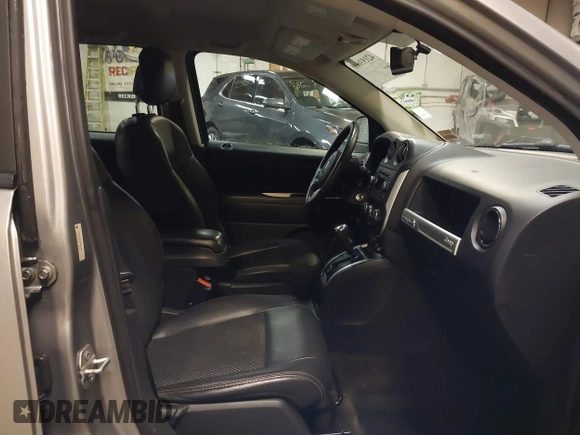 2016 Jeep Compass Latitude with VIN 1C4NJDEB4GD631759, listed as a IAAI auction lot 42193660 with 100,659 mi miles and . Bid and sale history available at DreamBid. Image 5.