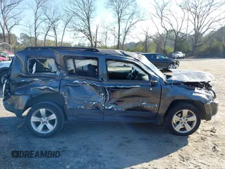 2014 Jeep Patriot Latitude with VIN 1C4NJPFB7ED856531, listed as a IAAI auction lot 41686649 with 107,889 mi miles and . Bid and sale history available at carsss.com. Image 6.