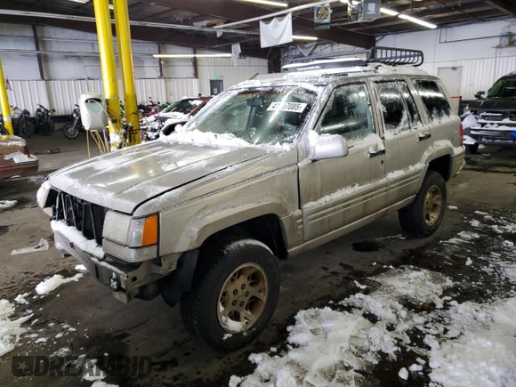 1997 Jeep Grand Cherokee Limited with VIN 1J4GZ78Y1VC706353, listed as a Copart auction lot 41437085 with 163,675 mi miles and Salvage Title. Bid and sale history available at carsss.com. Image 1.