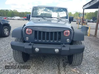 2014 Jeep Wrangler Unlimited Sport with VIN 1C4BJWDG3EL135351, listed as a IAAI auction lot 41947408 with 104,460 mi miles. Bid and sale history available at carsss.com. Image 12.