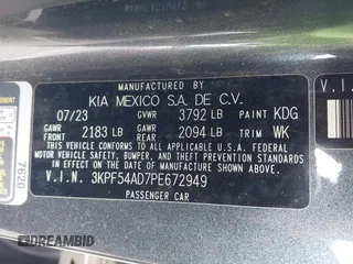 2023 Kia Forte GT-Line with VIN 3KPF54AD7PE672949, listed as a IAAI auction lot 41705154 with 14,897 mi miles. Bid and sale history available at carsss.com. Image 9.