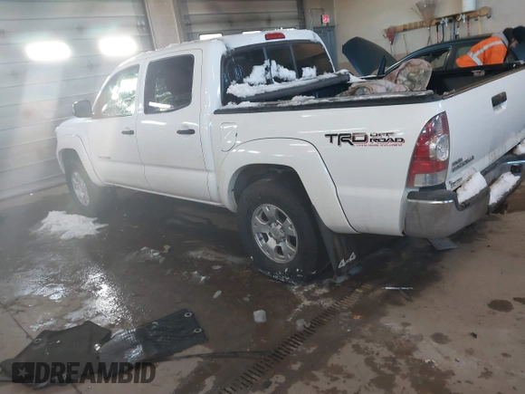 2013 Toyota Tacoma with VIN 3TMLU4EN2DM104490, listed as a IAAI auction lot 41636616 with 153,036 mi miles and . Bid and sale history available at DreamBid. Image 3.