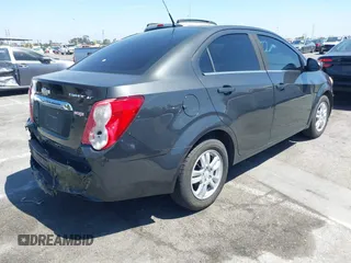 2014 Chevrolet Sonic LT with VIN 1G1JC5SB7E4146444, listed as a IAAI auction lot 42014386 with 85,122 mi miles and . Bid and sale history available at DreamBid. Image 4.