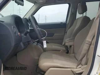 2015 Jeep Patriot Sport with VIN 1C4NJRBB2FD358059, listed as a Copart auction lot 60173745 with 129,984 mi miles and Salvage title. Bid and sale history available at DreamBid. Image 7.