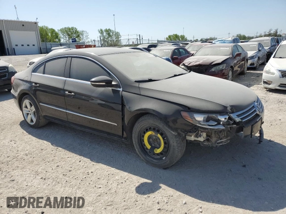 2014 Volkswagen CC Sport with VIN WVWBN7AN6EE529590, listed as a Copart auction lot 88780515 with 123,392 mi miles and Salvage Title. Bid and sale history available at DreamBid. Image 4.