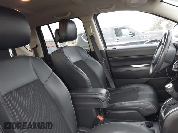 2014 Jeep Compass High Altitude with VIN 1C4NJCEA9ED647552, listed as a IAAI auction lot 41954070 with 110,474 mi miles. Bid and sale history available at carsss.com. Image 5.