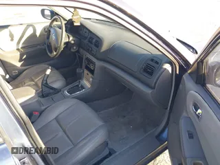 2002 Mazda 626 LX with VIN 1YVGF22D925287959, listed as a IAAI auction lot 41610932 with 122,333 mi miles. Bid and sale history available at carsss.com. Image 5.