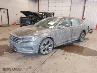 2021 Volkswagen Passat 2.0T SE with VIN 1VWSA7A30MC000721, listed as a IAAI auction lot 41614367 with 98,621 mi miles. Bid and sale history available at carsss.com. Image 2.