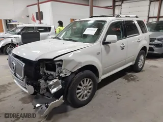 2009 Mercury Mariner Premier with VIN 4M2CU87779KJ14155, listed as a IAAI auction lot 41520138 with 175,980 mi miles. Bid and sale history available at carsss.com. Image 2.