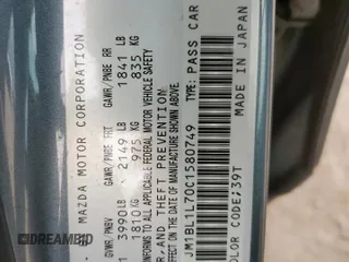 2012 Mazda 3 i Touring z VIN JM1BL1L70C1580749, wystawiony jako Copart lot #58774145 z przebiegiem 147 890 mil mil oraz Szkoda całkowita • Salvage title. Historia ofert i sprzedaży dostępna na DreamBid. Obrazek 13.