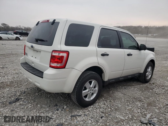 2011 Ford Escape XLS с VIN 1FMCU9C75BKA28653, выставлен на аукционе Copart как лот 51593435 с пробегом 68 625 миль миль и Списание • Salvage title. История ставок и продаж доступна на DreamBid. Изображение 3.