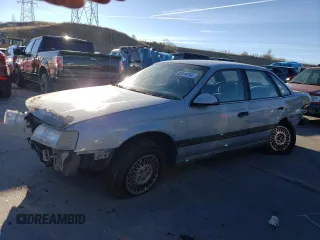 1991 Ford Taurus z VIN 1FACP52U3MA237495, wystawiony jako Copart lot #82519194 z przebiegiem 41 048 mil mil oraz Czysty tytuł • Clean title. Historia ofert i sprzedaży dostępna na DreamBid. Obrazek 1.
