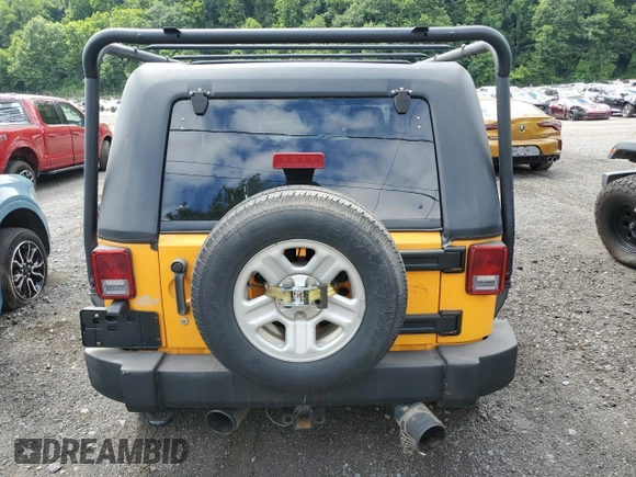 2012 Jeep Wrangler Sport with VIN 1C4AJWAG6CL247929, listed as a Copart auction lot 58942515 with 113,833 mi miles and Salvage title. Bid and sale history available at DreamBid. Image 6.