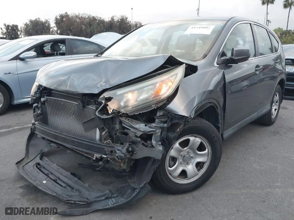 2015 Honda CR-V LX with VIN 3CZRM3H39FG706958, listed as a IAAI auction lot 41549880 with 85,567 mi miles. Bid and sale history available at carsss.com. Image 2.