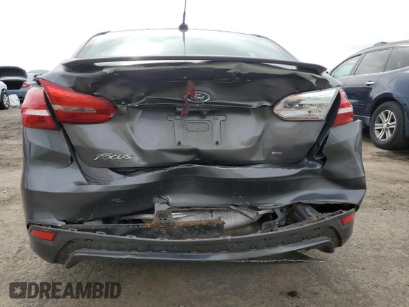 2015 Ford Focus SE with VIN 1FADP3F20FL267322, listed as a Copart auction lot 53678225 with 83,048 mi miles and Salvage Title. Bid and sale history available at DreamBid. Image 6.