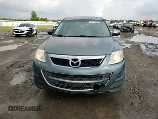2011 Mazda CX-9 Touring with VIN JM3TB2CA1B0325032, listed as a Copart auction lot 54110615 with 134,418 mi miles and Salvage title. Bid and sale history available at DreamBid. Image 14.
