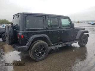 2022 Jeep Wrangler Unlimited Sahara with VIN 1C4HJXEGXNW211886, listed as a Copart auction lot 54877645 with 64,815 mi miles and Salvage title. Bid and sale history available at DreamBid. Image 3.