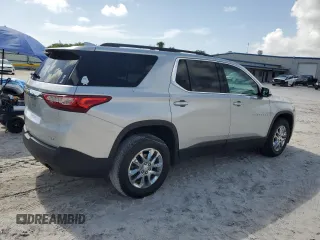 2019 Chevrolet Traverse LT Cloth z VIN 1GNERGKW8KJ320242, wystawiony jako Copart lot #60324095 z przebiegiem 103 680 mil mil oraz Szkoda całkowita • Salvage title. Historia ofert i sprzedaży dostępna na DreamBid. Obrazek 3.