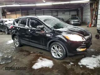 2015 Ford Escape Titanium with VIN 1FMCU0J91FUA41653, listed as a Copart auction lot 88871205 with 128,971 mi miles and Salvage Title. Bid and sale history available at DreamBid. Image 4.