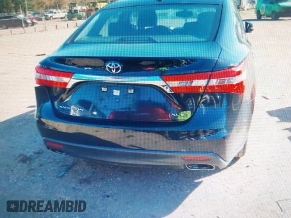 2014 Toyota Avalon Limited with VIN 4T1BK1EB4EU096164, listed as a IAAI auction lot 40904808 with 242,086 mi miles. Bid and sale history available at carsss.com. Image 15.