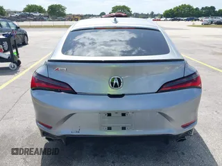 2023 Acura Integra w/A-Spec Package with VIN 19UDE4H39PA009519, listed as a IAAI auction lot 42168571 with 14,661 mi miles and . Bid and sale history available at DreamBid. Image 16.