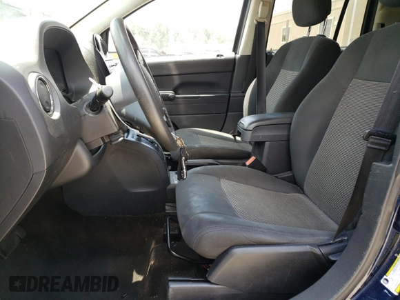 2015 Jeep Compass Sport with VIN 1C4NJCBB7FD110676, listed as a Copart auction lot 58674814 with 165,348 mi miles and Salvage Title. Bid and sale history available at carsss.com. Image 7.