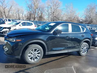 2023 Mazda CX-5 2.5 S with VIN JM3KFBAM9P0230299, listed as a IAAI auction lot 41656657 with 17,290 mi miles. Bid and sale history available at carsss.com. Image 15.