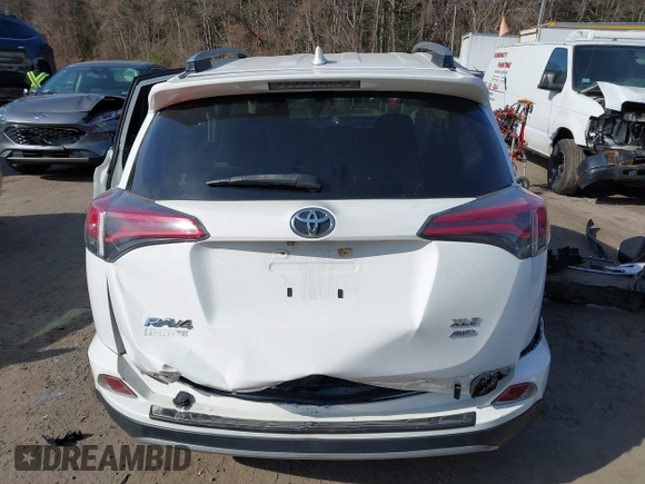 2018 Toyota RAV4 XLE with VIN JTMRFREV1JJ259705, listed as a IAAI auction lot 41779233 with 73,099 mi miles. Bid and sale history available at carsss.com. Image 16.