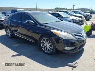 2013 Hyundai Azera with VIN KMHFH4JG4DA287957, listed as a IAAI auction lot 41763771 with 165,764 mi miles. Bid and sale history available at carsss.com. Image 1.
