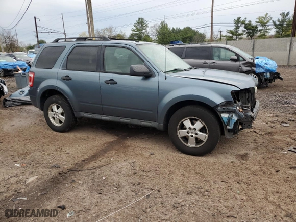 2010 Ford Escape XLT with VIN 1FMCU0D74AKD01784, listed as a Copart auction lot 52857725 with 119,448 mi miles and Salvage Title. Bid and sale history available at carsss.com. Image 4.