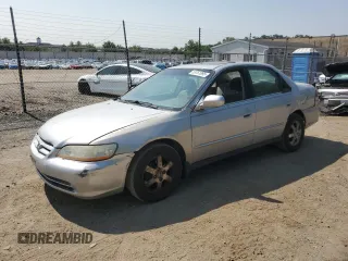 2002 Honda Accord SE z VIN 1HGCG66862A091556, wystawiony jako Copart lot #59751995 z przebiegiem 121 427 mil mil oraz Czysty tytuł • Clean title. Historia ofert i sprzedaży dostępna na DreamBid. Obrazek 1.