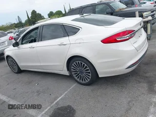 2017 Ford Fusion SE with VIN 3FA6P0HD0HR180188, listed as a IAAI auction lot 42146020 with 100,901 mi miles and . Bid and sale history available at DreamBid. Image 14.