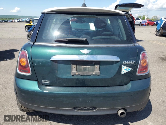 2010 MINI Hardtop z VIN WMWMF3C59ATZ21719, wystawiony jako Copart lot #56020765 z przebiegiem 96 249 mil mil oraz Szkoda całkowita • Salvage title. Historia ofert i sprzedaży dostępna na DreamBid. Obrazek 6.