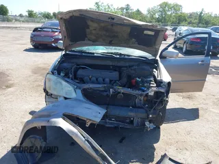2003 Toyota Corolla CE with VIN 2T1BR32E53C015709, listed as a IAAI auction lot 42057744 with 120,022 mi miles and . Bid and sale history available at DreamBid. Image 6.