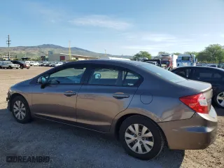 2012 Honda Civic Sdn LX with VIN 2HGFB2F5XCH526592, listed as a Copart auction lot 50404725 with 173,532 mi miles and Clean Title. Bid and sale history available at carsss.com. Image 2.