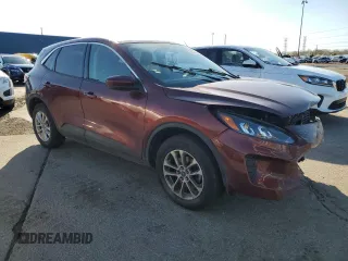 2021 Ford Escape SE with VIN 1FMCU9G67MUA94906, listed as a Copart auction lot 54310725 with 84,595 mi miles and Salvage title. Bid and sale history available at DreamBid. Image 4.